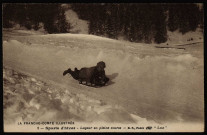 Sports d'hiver à Besançon - Lugeur en pleine course [image fixe] , Paris : B. F. "Lux" avec petit rameau fleuri, 1904-1920