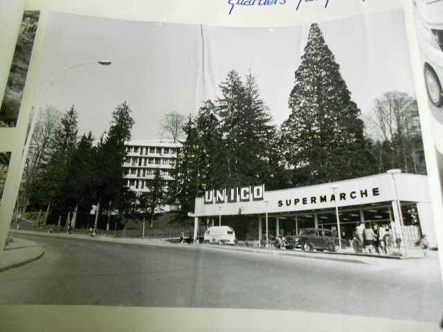 Thématique "Services".- Sous-thématique "industrie et commerce" : 5 photographies et 2 plans de la zone industrielle de Trépillot ; 5 photographies du centre commercial des Epoisses dans la zone à urbaniser en priorité (ZUP) dont 3 du supermarché SUMA, 1 du supermarché UNICO dans le quartier des Clairs Soleils ; sous-thématique "dans la Boucle" : 1 photographie de la pâtisserie Quedillac, 1 de la boulangerie-pâtisserie Le Bas, 1 des magasins Modelia et Marc.