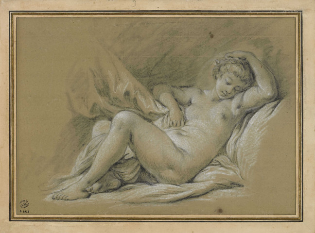 Femme nue couchée sur un lit