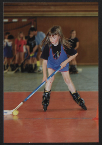 Sports collectifs - Roller-hockey, enfants jouant au roller-hockeyM. Tupin